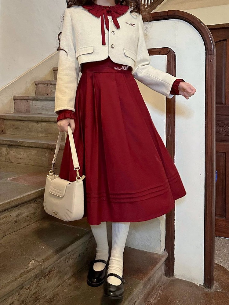 Weiße Tweedjacke mit Blumenstickerei