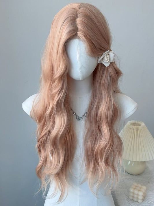 ピンクブロンドのウエスト丈ウェーブ合成ウィッグ