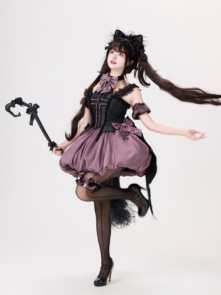 Jupe bulle noire et violette avec ailes de chauve-souris dans le dos