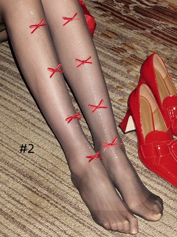 Strumpfhose mit Strass-Schleife