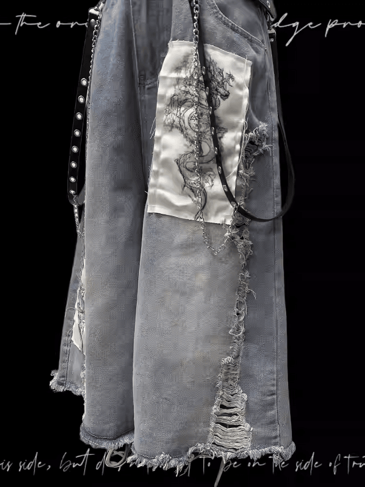 Blaue Jeans mit weitem Bein, Drachen-Applikation, ungesäumter Saum, abgenutzte Löcher, leicht