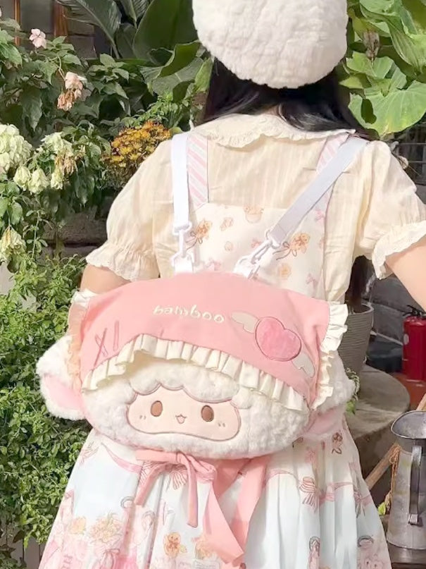 Weiß-rosa Plüschrucksack in Lammform mit Schleife