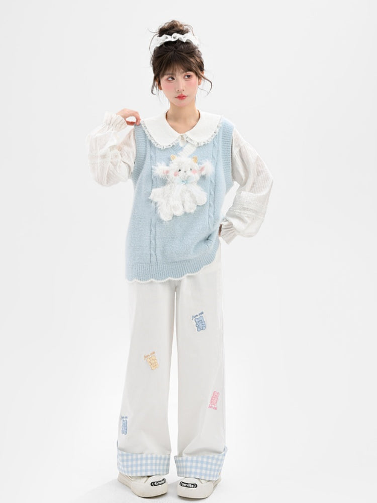 Yume Kawaii Blaue Strickweste mit Plüschlamm vorne