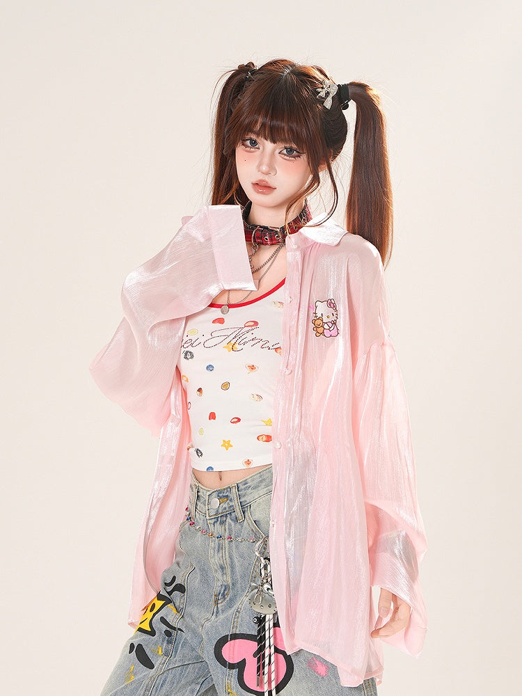 Sonnenschutz-Shirt mit Herzmotiv in Rosa/Aprikose und Rüschenschleife auf der Rückseite