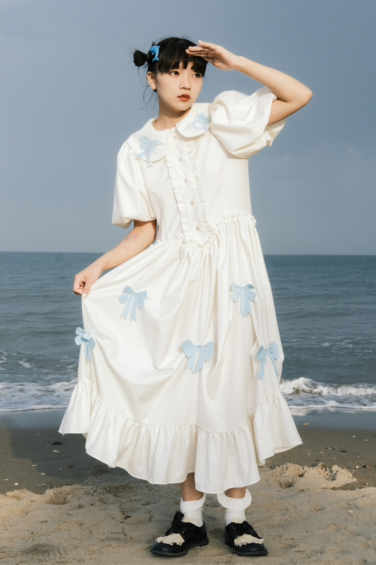 Prinzessinnenkleid mit Ballonärmeln und Schleife