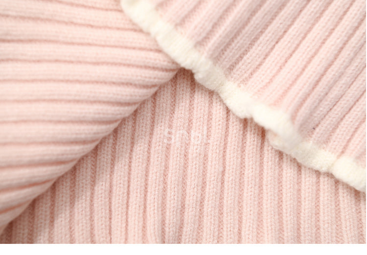 Haut en maille slim à col rond et détails nœud rose