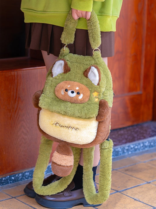 緑と茶色のかわいいレッサーパンダのぬいぐるみバックパック