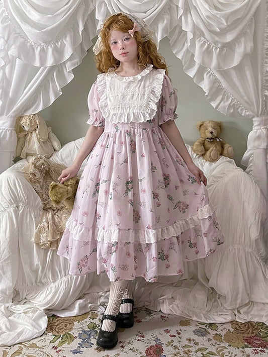 Rosa Hauskleid mit Puffärmeln und Blumendruck