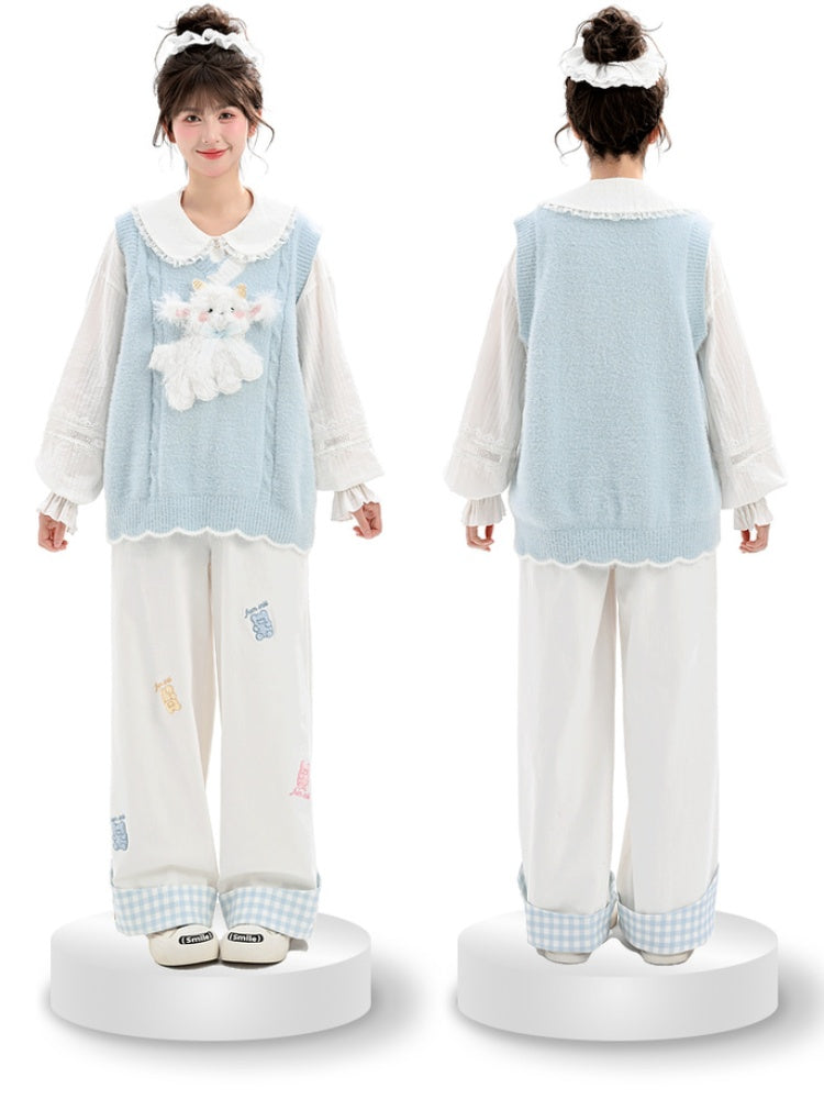Yume Kawaii Blaue Strickweste mit Plüschlamm vorne