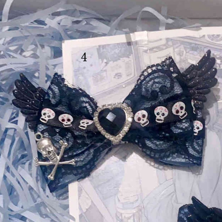 Schwarz-blaue Skelettmuster-Flügel-Jirai-Kei-Haarspange
