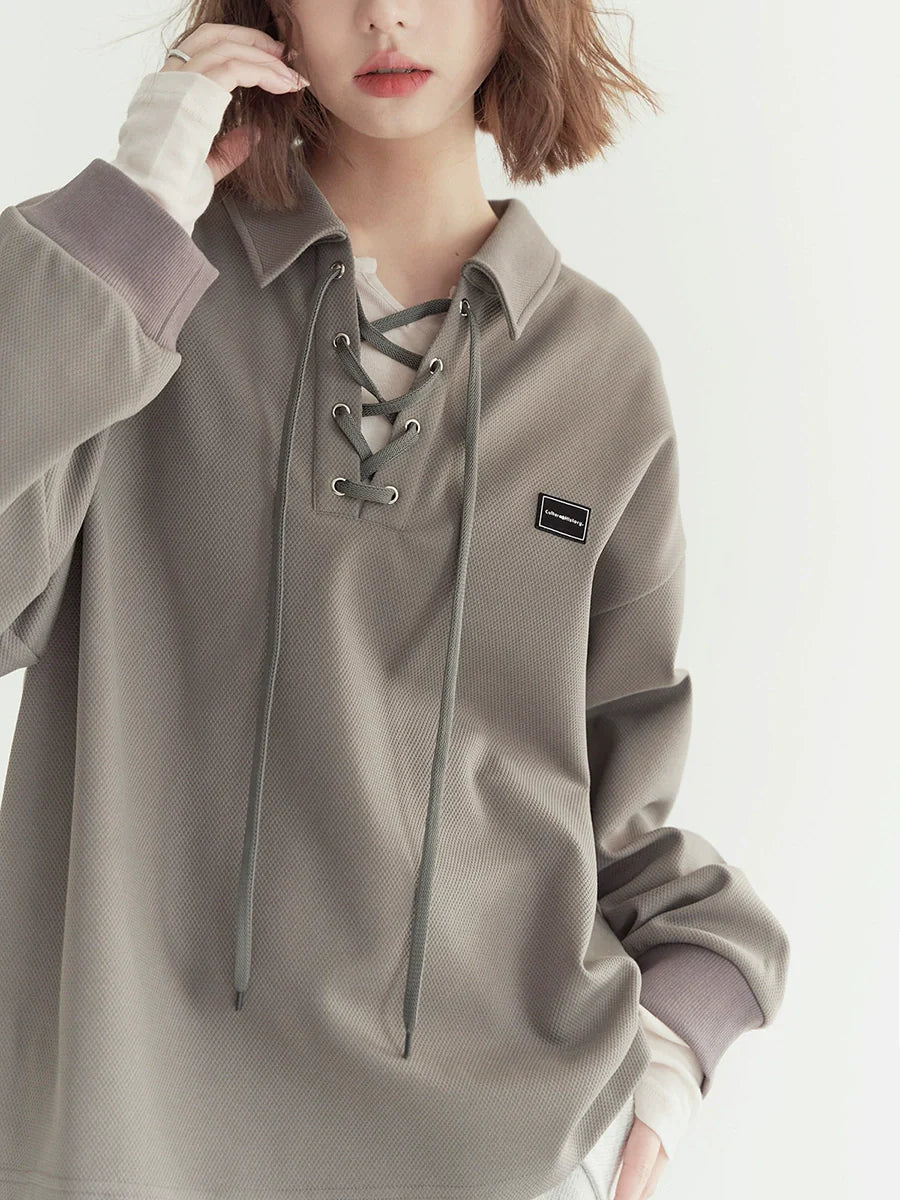 Lockeres Poloshirt mit Schnürung am Hals