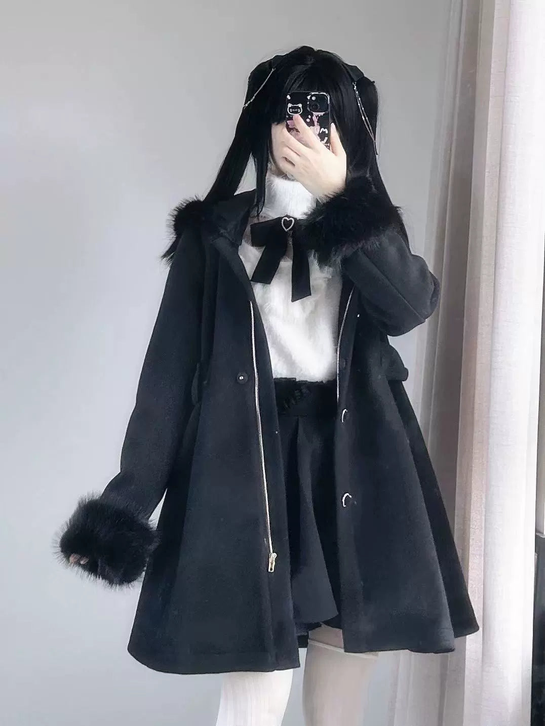 Manteau en fourrure noire pour petit lapin