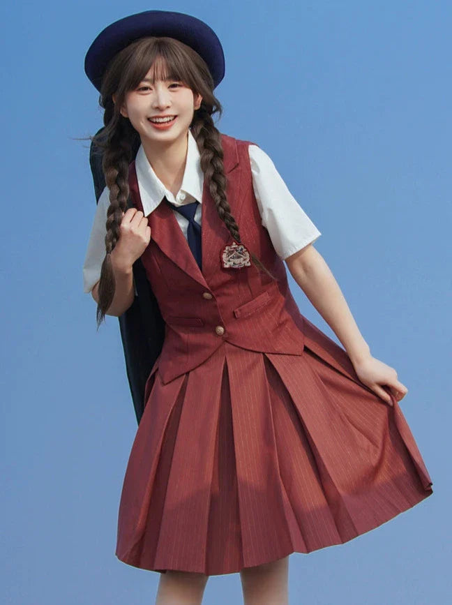 Jupe plissée style collège gilet rouge brique + rayures