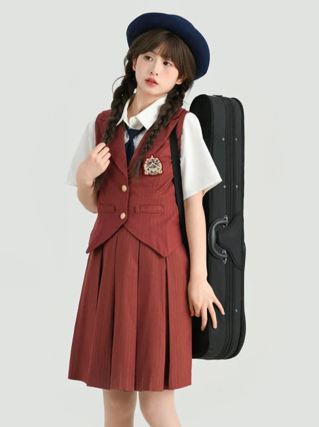 Jupe plissée style collège gilet rouge brique + rayures