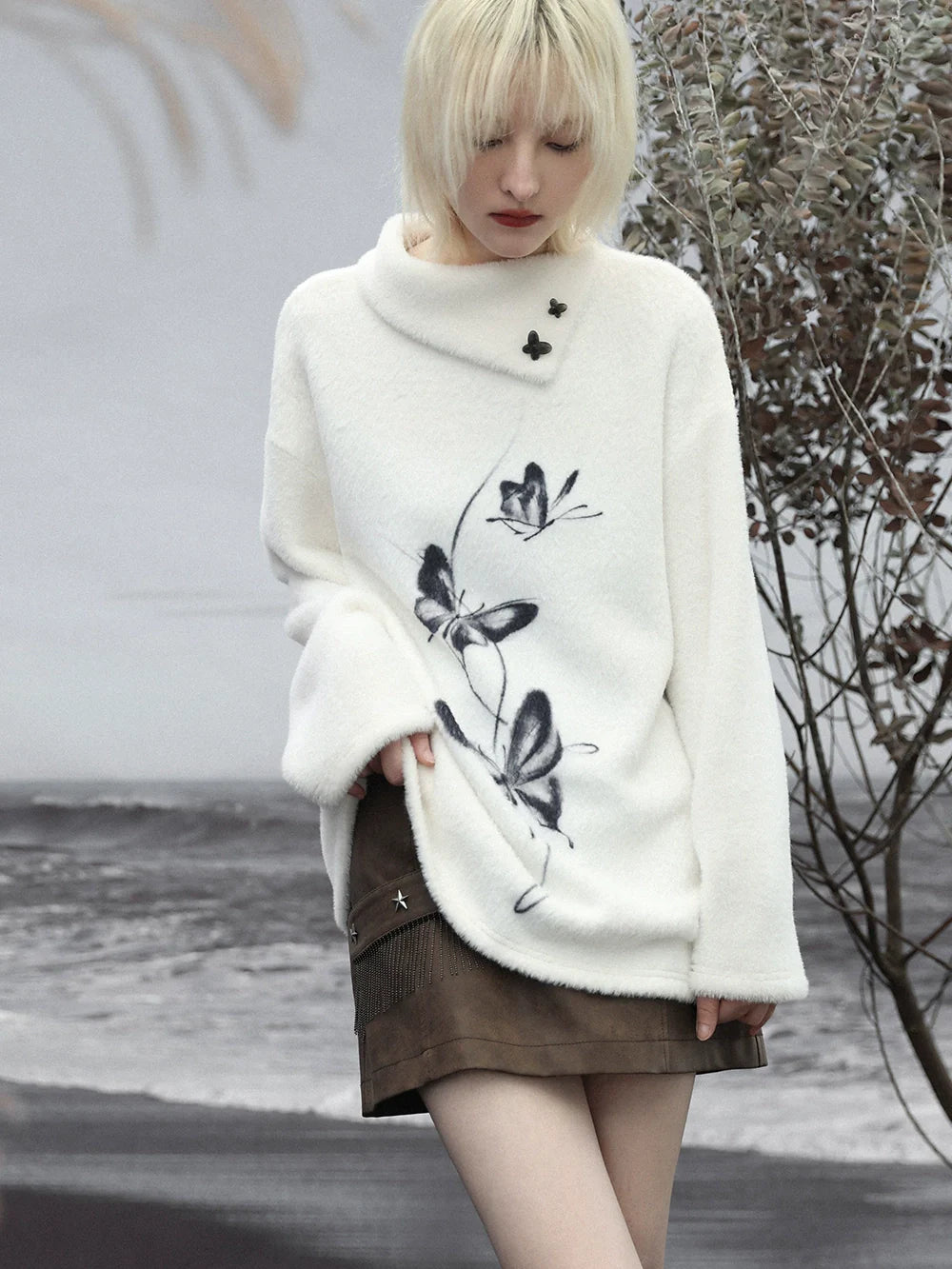 Haut papillon en vison pur blanc