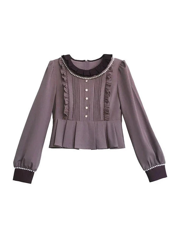 Haut violet rétro avec nœud et jupe grande élégante et évasée fumée