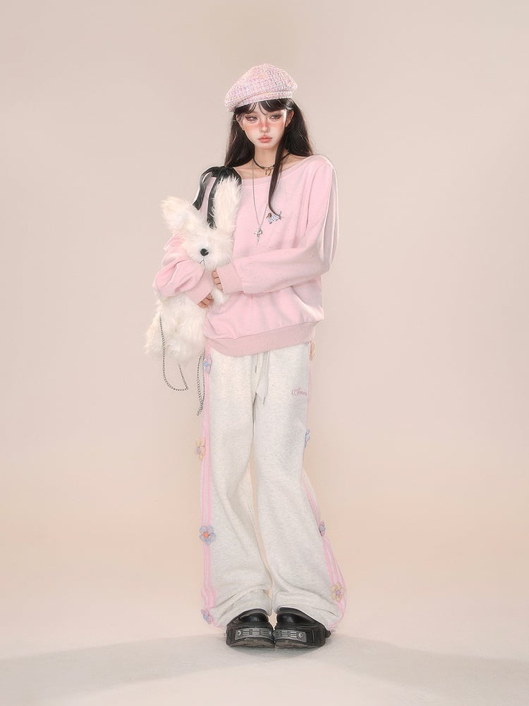 グレーピンクの花柄ストレートレッグカットパンツ