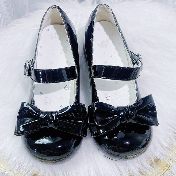 Süße schwarze Lolita Mary Janes mit Schleife und runder Zehenpartie und Blockabsatz