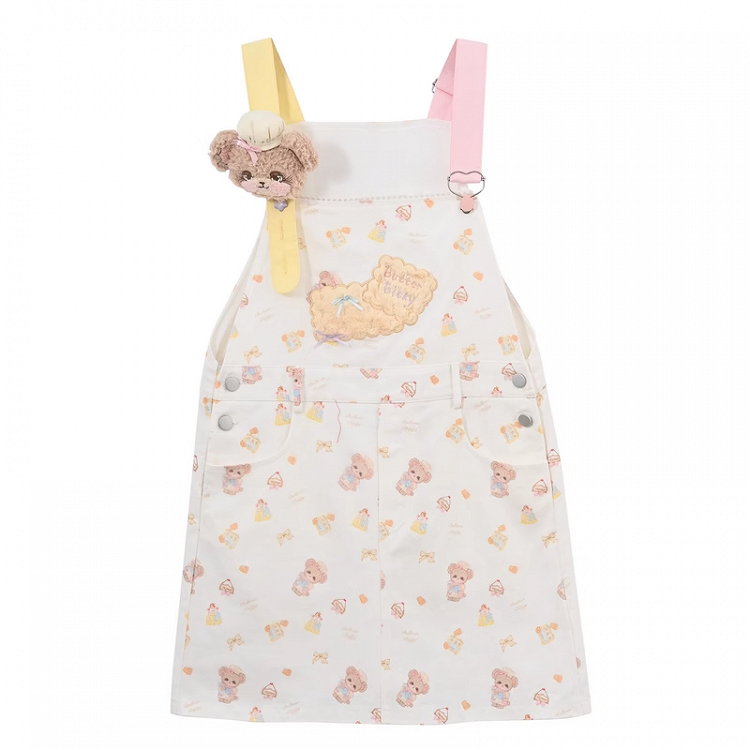 クマの刺繍アップリケ付きホワイトぬいぐるみクッキーとプリント総柄オーバーオールスカート