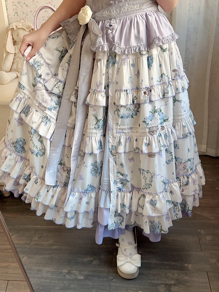 Rosa Lolita-Rock im Hausstil mit Kätzchen- und Blumendruck vorne und Knopfleiste