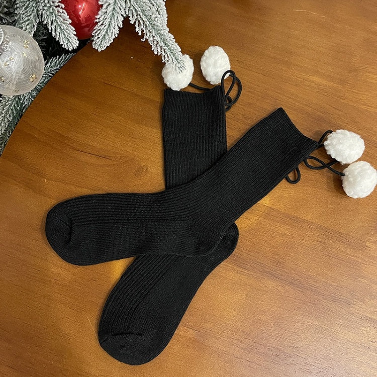 Chaussettes mollet blanches à pompons