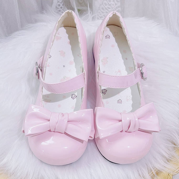 Süße rosa Lolita Mary Janes mit Schleife und runder Zehenpartie und Blockabsatz