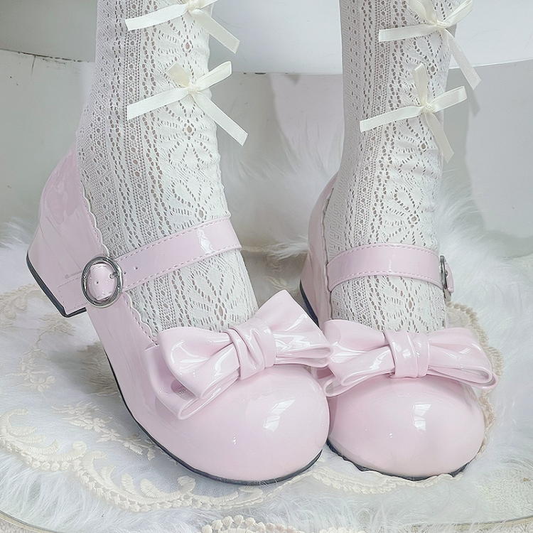 Süße rosa Lolita Mary Janes mit Schleife und runder Zehenpartie und Blockabsatz