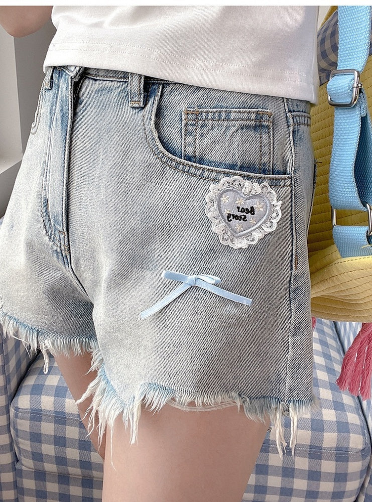 Vintage Denim Shorts Blue Raw Hem Heart Accent Light