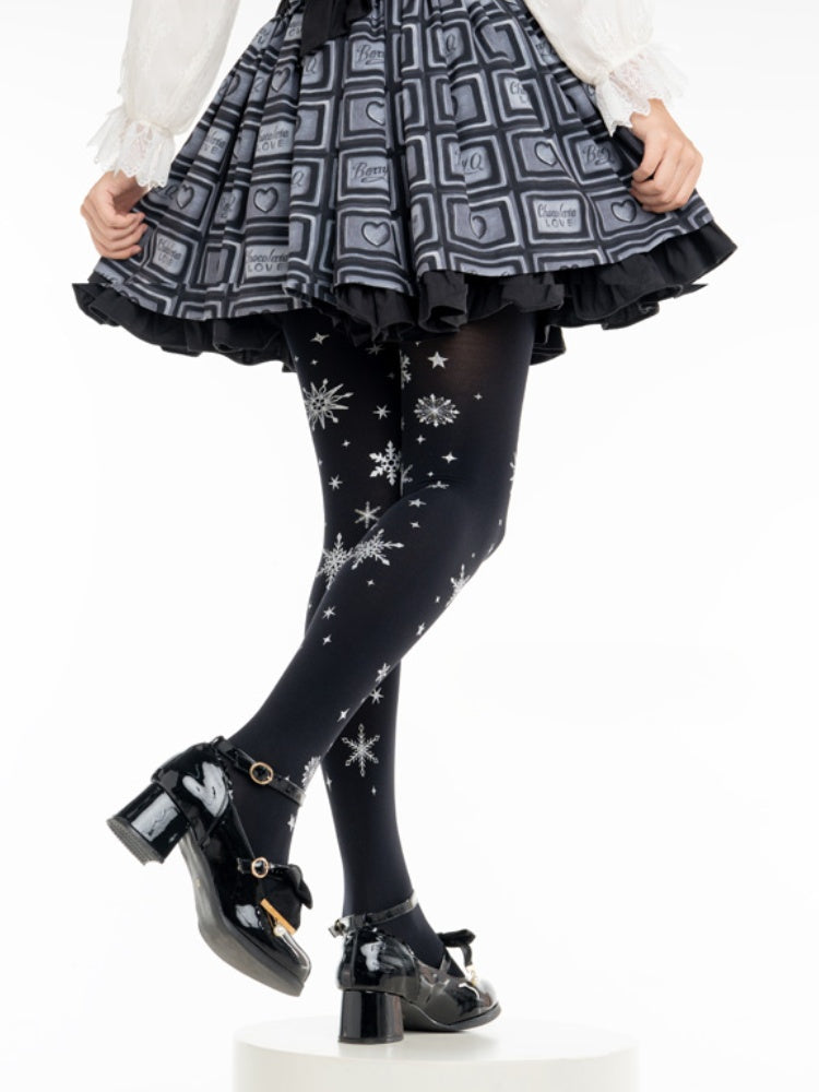 Weiß/schwarze Lolita-Strumpfhose mit Schneeflocken-Print