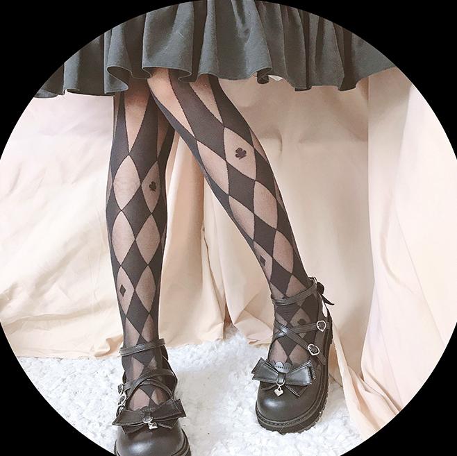 Schwarz/weiße Strumpfhose mit Zirkus-Rautenmuster