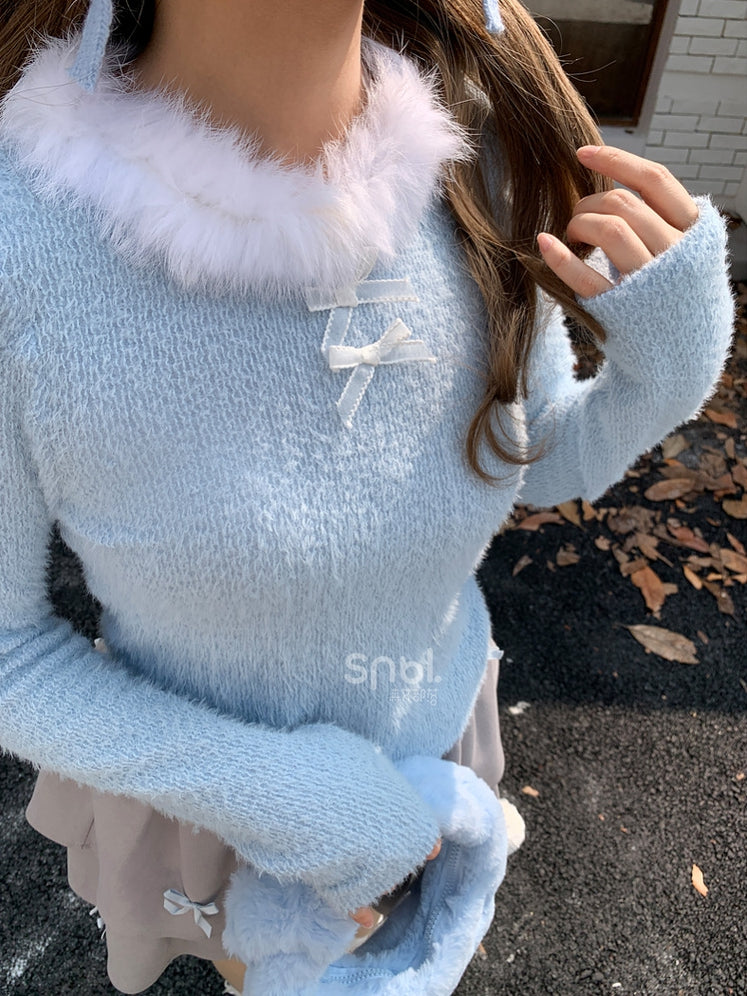 Haut à manches longues et col en peluche bleu avec détails nœud