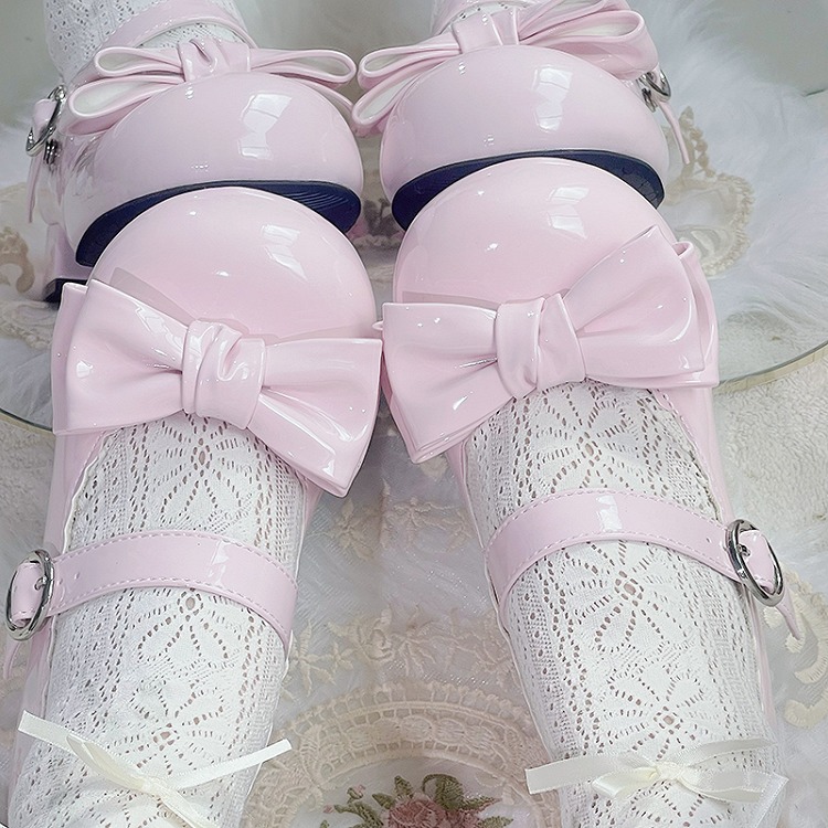 Süße rosa Lolita Mary Janes mit Schleife und runder Zehenpartie und Blockabsatz