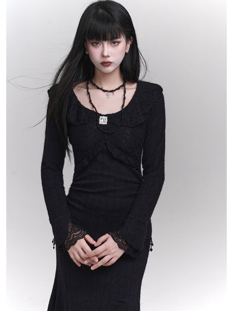 Robe sirène noire ajustée à col rond et détails en perles