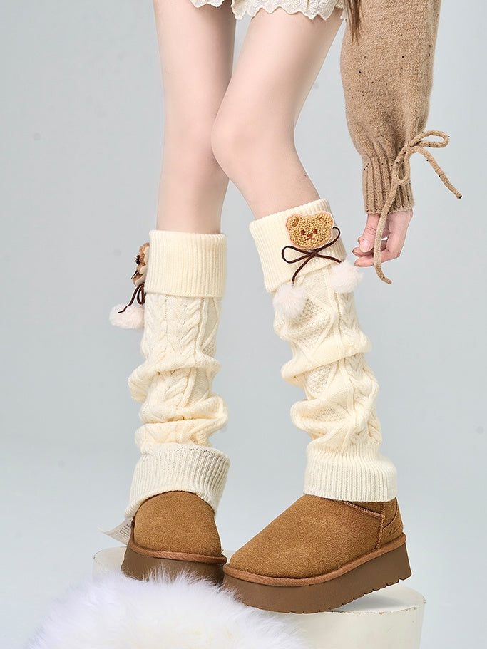 Apricot Bear – Beinwärmer mit Schleife und Pompons