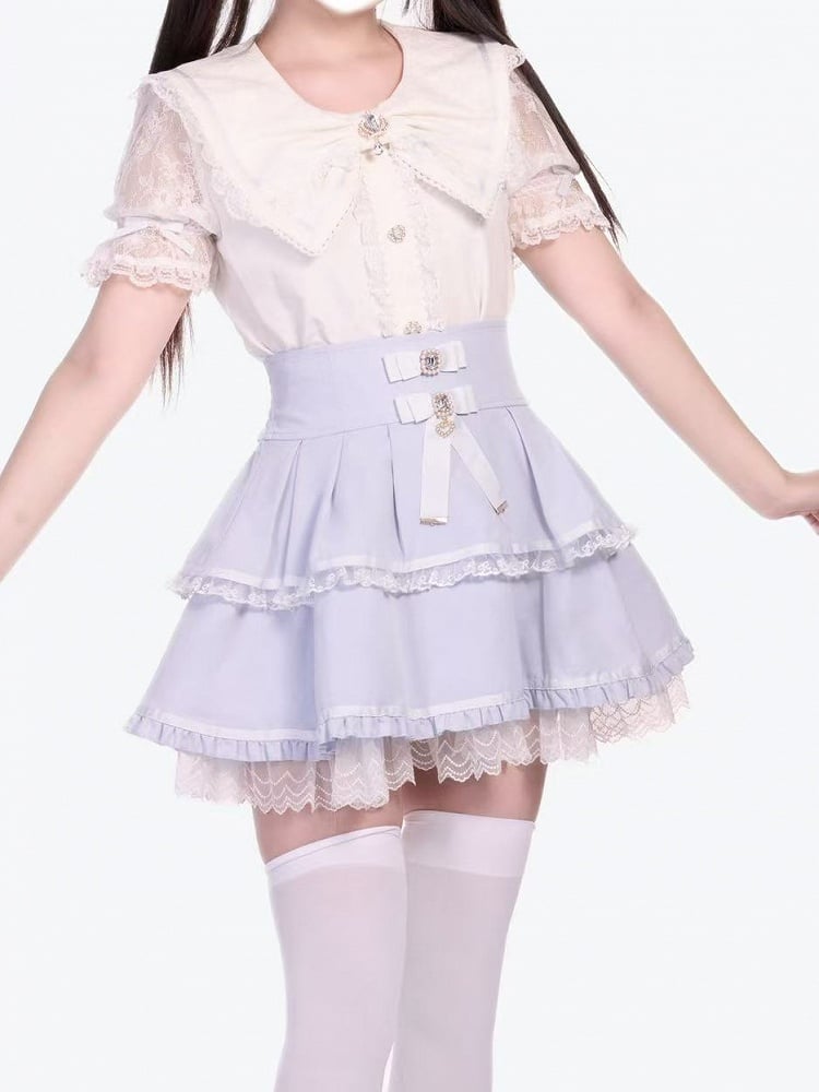 Kei Jirai – Bluse mit weißem Kragen und Schleife