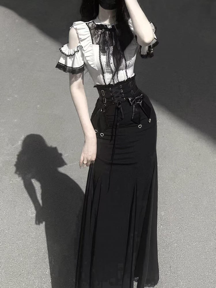 Rockclips mit Schleife und Herzanhänger in Schwarz