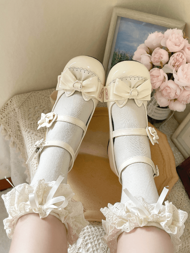 Aprikosenfarbene Lolita Mary Janes mit Schleife und katzenförmigem Schnallenriemen und Blockabsatz