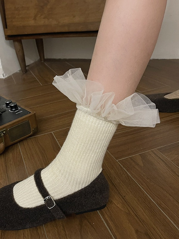 Chaussettes mollet blanches à bordure en dentelle douce
