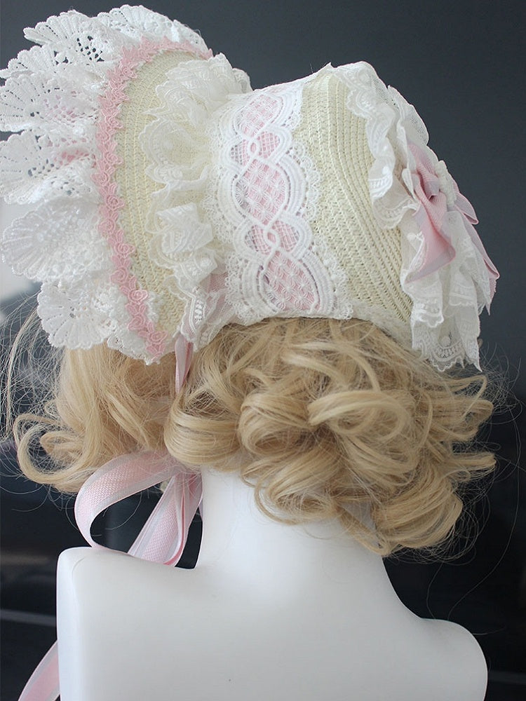Rosa/blaue Haube mit floralen Schleifendetails und Spitzenbesatz