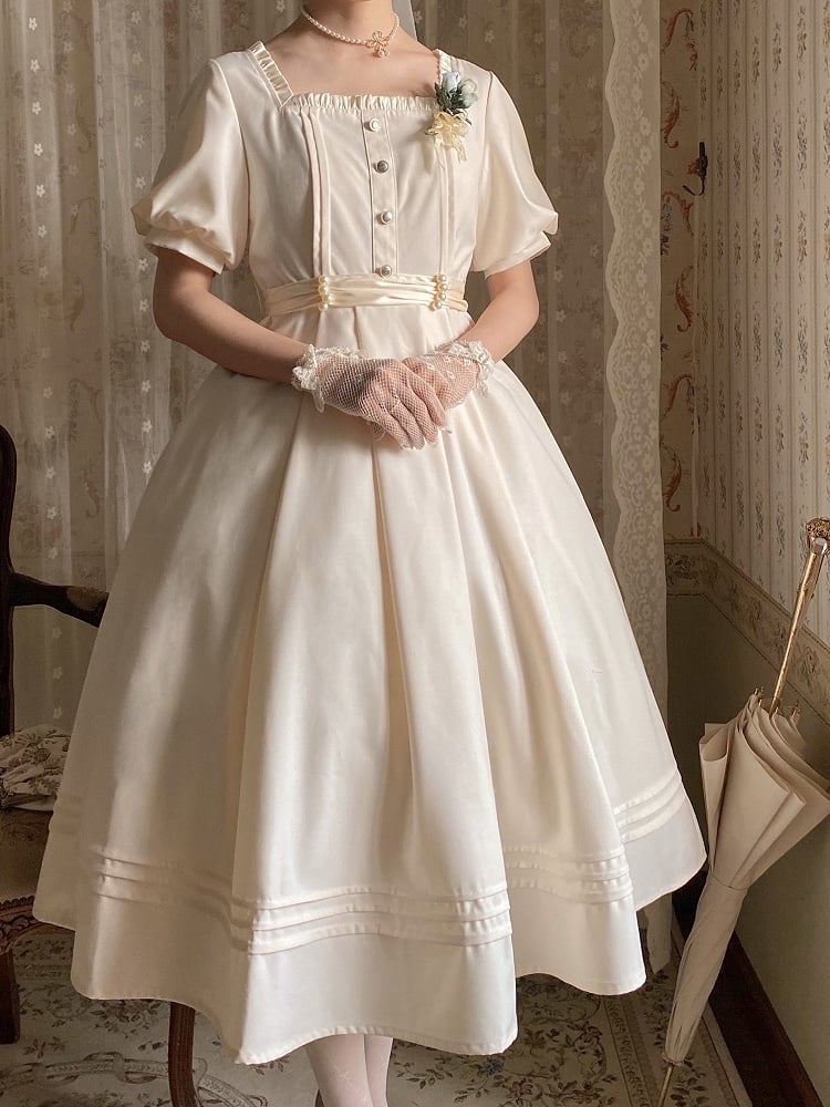 Elegantes Kleid mit Ausschnitt und quadratischem Vintage-Apricot mit kurzen Puffärmeln