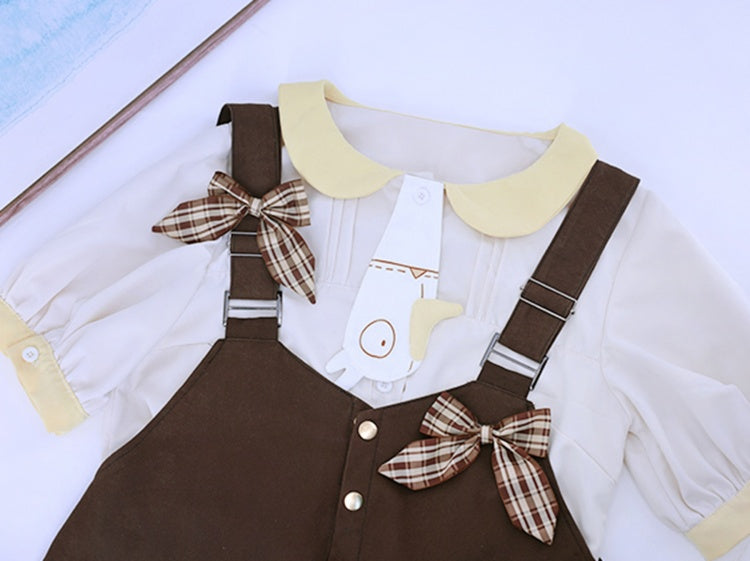 ダークブラウンのチェック柄リボンディテールオーバーオールショーツ