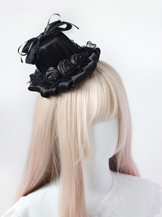 Schwarzes Gothic-Top mit Rosen und Mini-Schleife