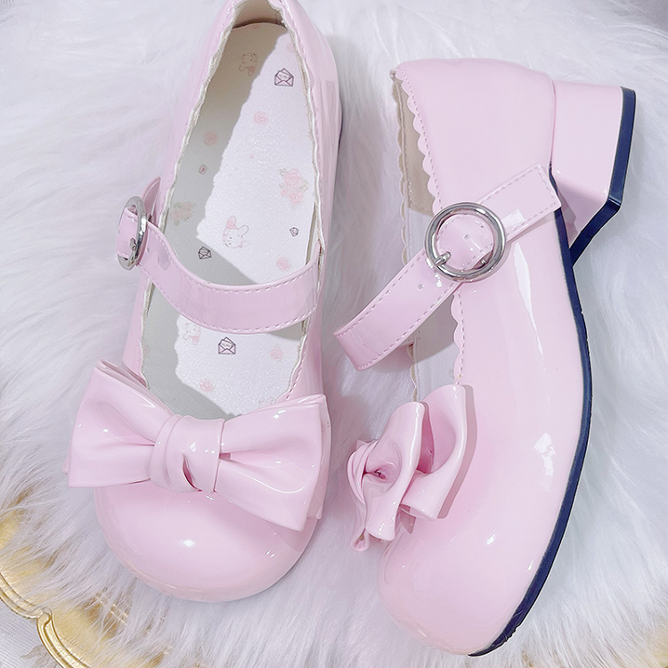 Süße rosa Lolita Mary Janes mit Schleife und runder Zehenpartie und Blockabsatz