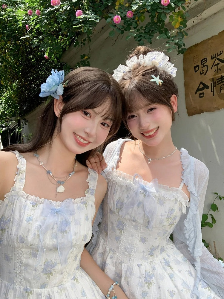 トリムライトブルーの蝶結びカフスのディテールオープンプラケットシフォンカーディガンフリル