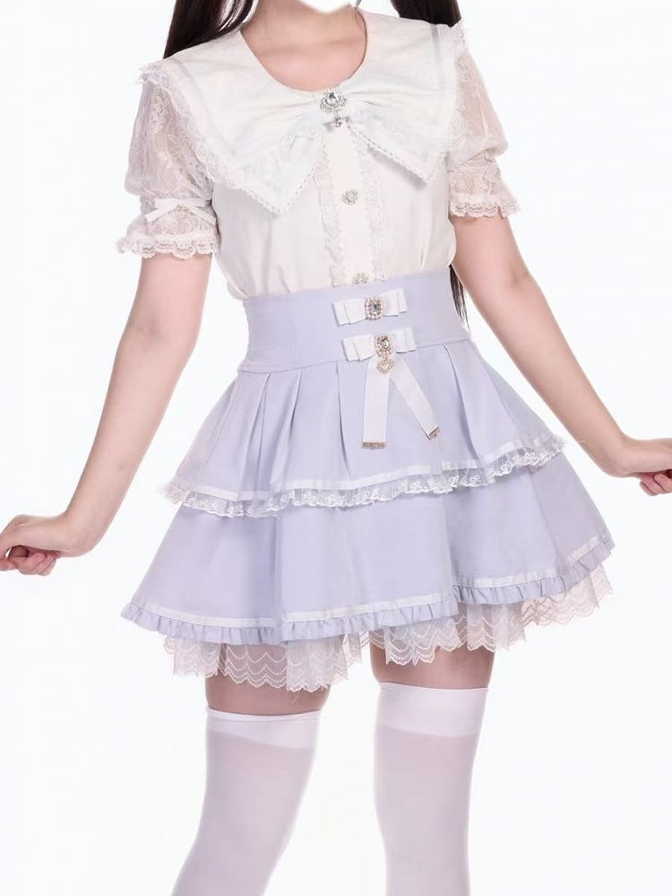 Kei Jirai – Bluse mit weißem Kragen und Schleife