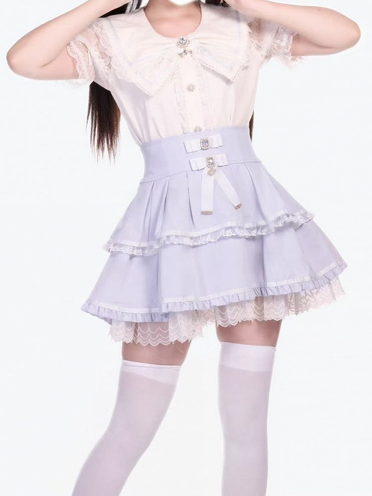 Kei Jirai – Bluse mit weißem Kragen und Schleife