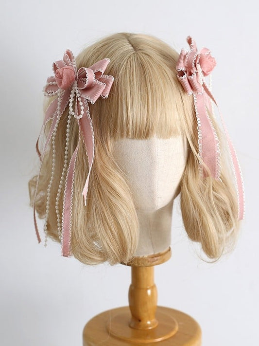 花柄で飾られたスイートなホワイトピンクのビーズの蝶結びデザインのヘアクリップ ロリータ