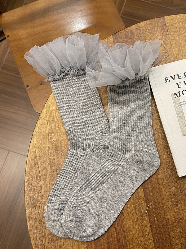 Chaussettes mollet blanches à bordure en dentelle douce
