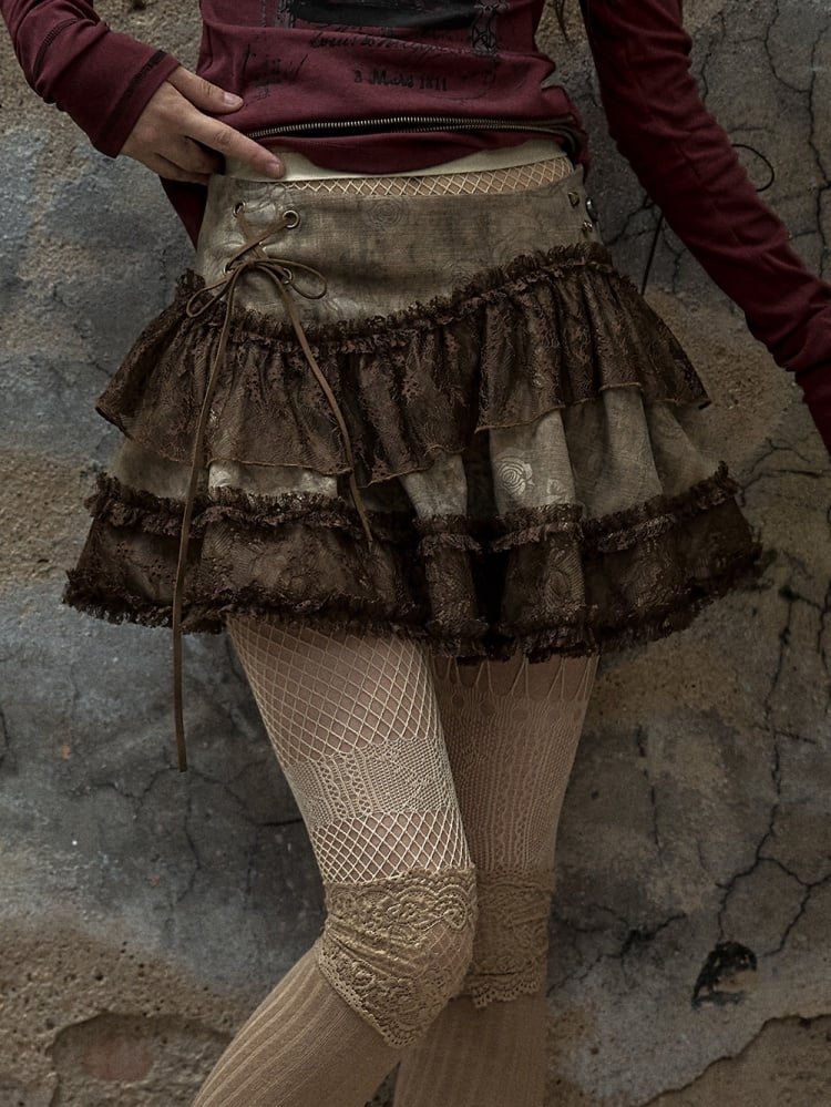 Kaffeefarbener Vintage-Minirock mit niedriger Taille und asymmetrischer Spitze