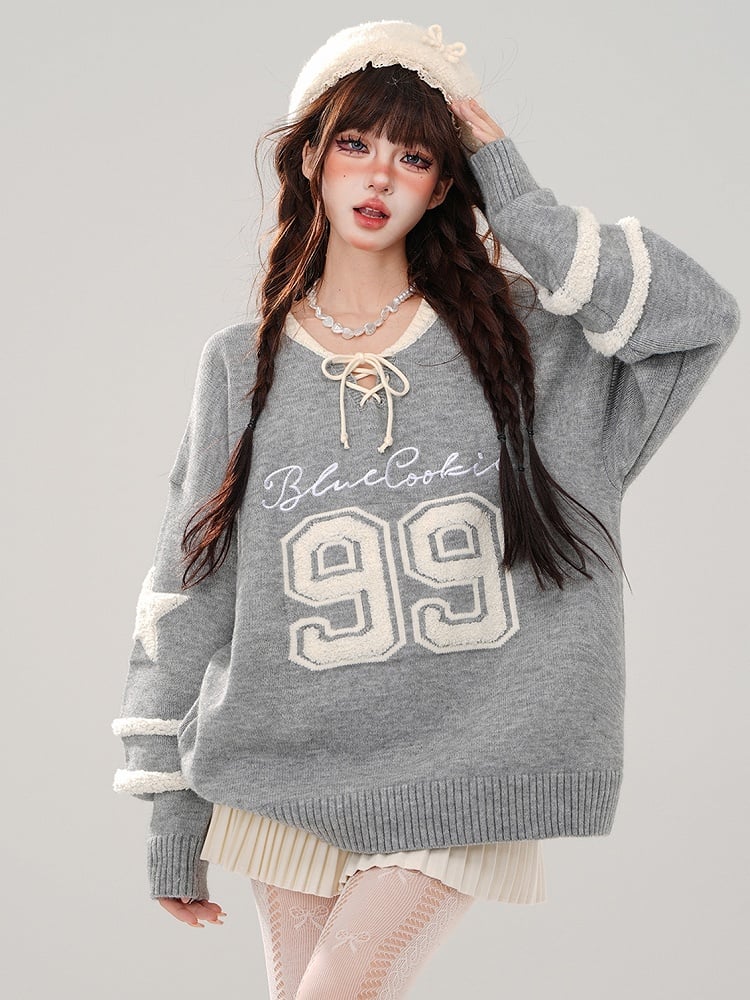 Rot/grauer Pullover mit V-Ausschnitt und Schnürdetail
